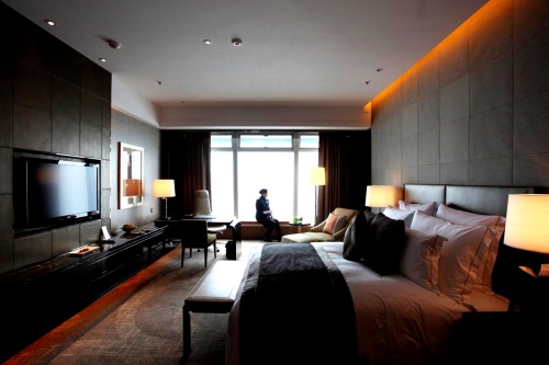 A general view shows a bedroom of the Ritz-Carlton hotel inside the International Commerce Centre (ICC) in Hong Kong on March 29, 2011. Occupying the 102nd to 118st floors, the world's highest hotel opened its doors housed in the city's tallest skyscraper and offering unrivalled panoramic views of the world famous Victoria Harbour. AFP PHOTO / ED JONES (Photo credit should read Ed Jones/AFP/Getty Images)